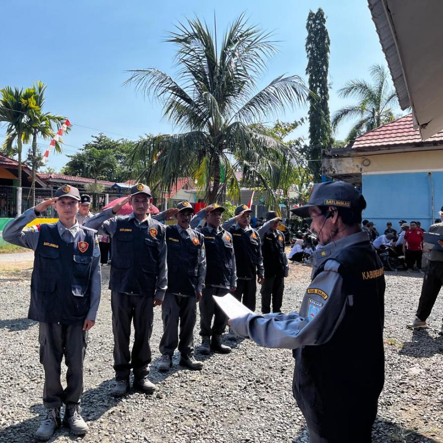 LINMAS Desa Bawahan Seberang Ikuti Lomba Baris Berbaris Tingkat Kecamatan Mataraman